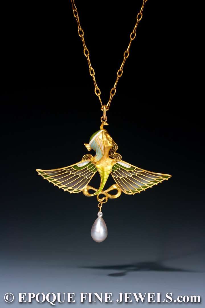 An Art Nouveau gold, enamel, plique-à-jour enamel, pearl and diamond pendant